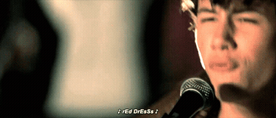 Man With Glasses And Headphones Talking Into Microphone GIF