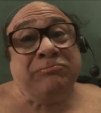 Man With Glasses and Headset Eating Corn