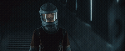 Man With Glasses And Helmet In Dark Room GIF