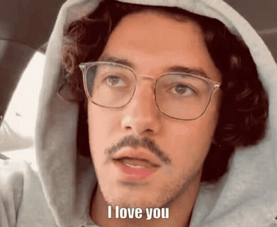 Man With Glasses And Hoodie Saying I Love You GIF