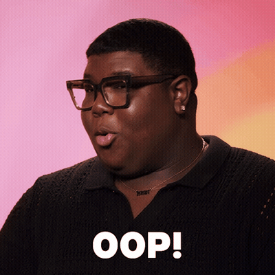 Man With Glasses And Jimmy Necklace Saying Oops GIF