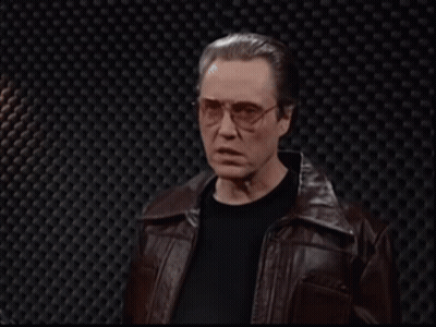 Man With Glasses And Leather Jacket Says Explore The Space GIF