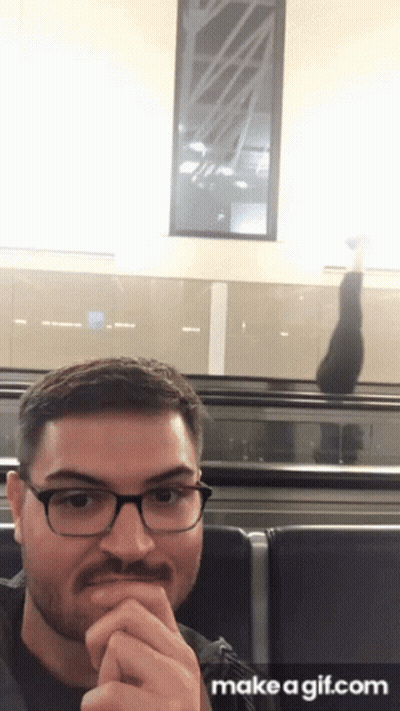 Man With Glasses And Mustache At Airport Make A Gif.com GIF