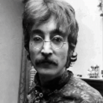 Man With Glasses And Mustache In Black And White Photo GIF