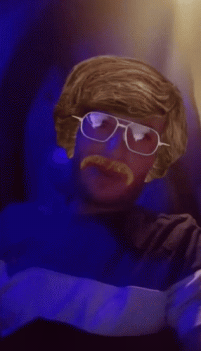 Man With Glasses And Mustache In Blue Shirt Saying Ice GIF