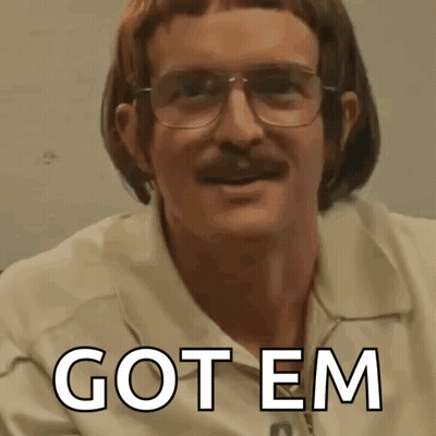 Man With Glasses And Mustache In Got Em Shirt GIF