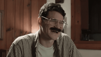 Man With Glasses And Mustache Laughing GIF