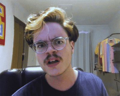 Man With Glasses And Mustache Making A Face GIF