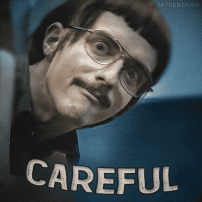 Man With Glasses And Mustache Saying Careful GIF