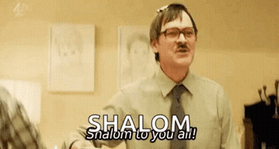 Man With Glasses And Mustache Says Shalom To You All GIF
