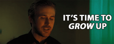 Man With Glasses And Mustache Sitting On Red Chair GIF