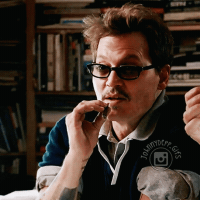 Man With Glasses And Mustache Wearing Johnny Depp Logo GIF
