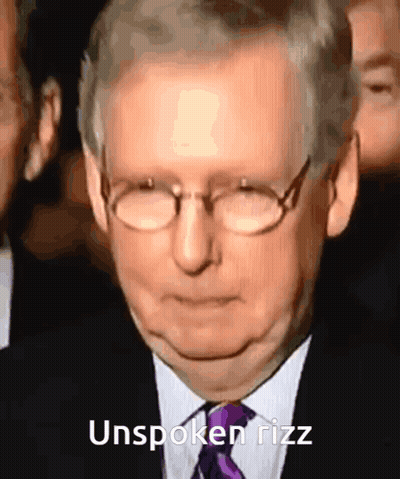 Man With Glasses and Purple Tie Unspoken Rizz