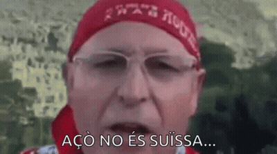 Man With Glasses And Red Headband Says Aço No Es Suissa GIF