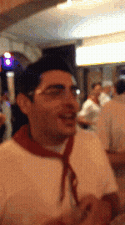 Man With Glasses And Red Scarf Smiling GIF
