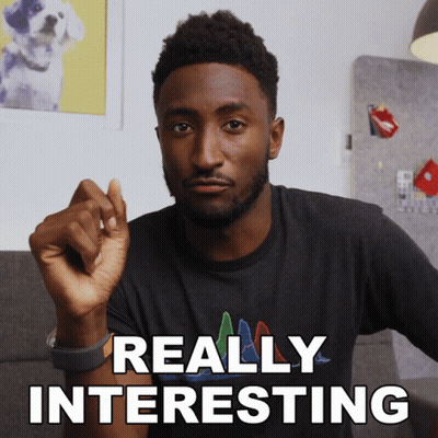 Man With Glasses And Red Sweater Very Interesting GIF