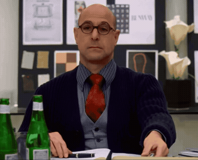 Man With Glasses And Red Tie Sitting At Table GIF