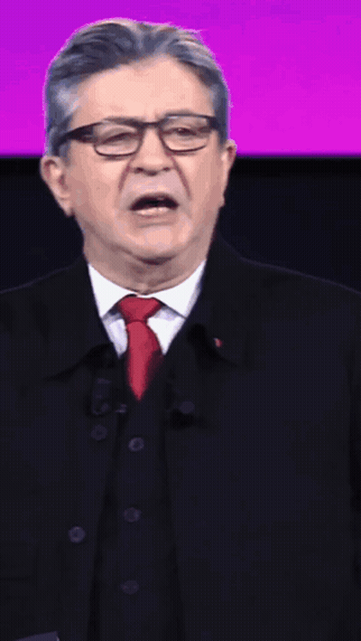 Man With Glasses And Red Tie Speaking Into Microphone GIF