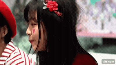 Man With Glasses And Santa Hat Looking Sideways GIF