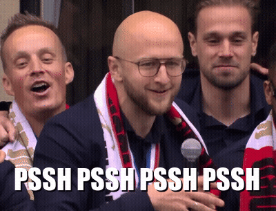 Man With Glasses And Scarf Says Pssh Pssh GIF