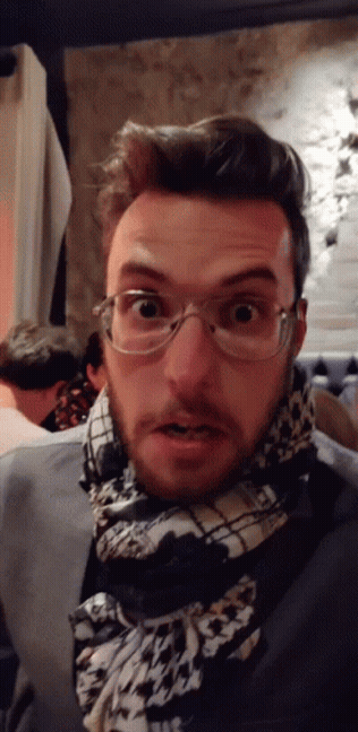 Man With Glasses And Scarf Surprised GIF
