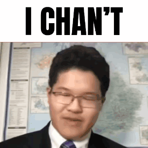 Man With Glasses And Suit Making Funny Face GIF
