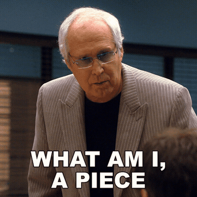 Man With Glasses And Suit Says What Am I A Piece GIF
