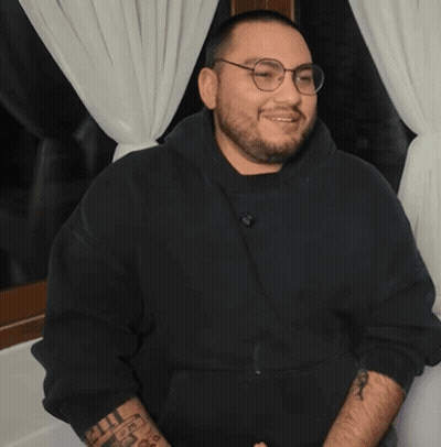 Man With Glasses And Tattoo Covering Mouth GIF