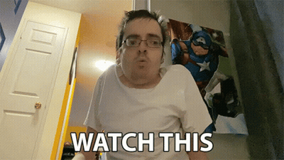 Man With Glasses And White Shirt Saying Watch This GIF