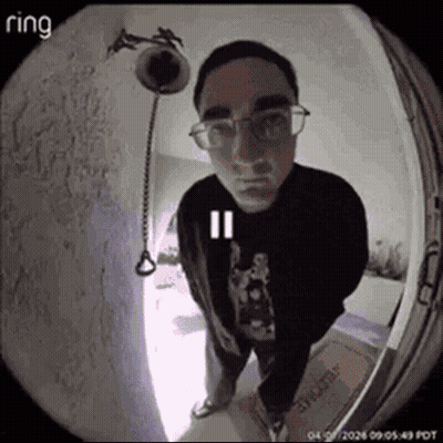 Man With Glasses At Door With Ring Camera GIF