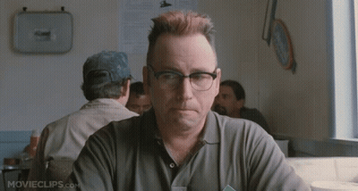 Man With Glasses at Table