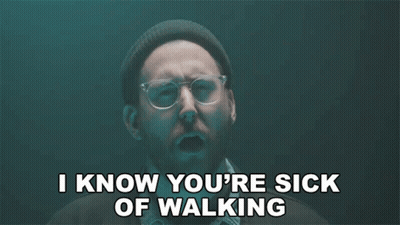 Man With Glasses Beanie Says Sick Of Walking GIF