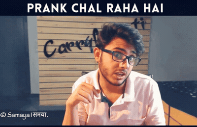 Man With Glasses By Wall Saying Carpet GIF