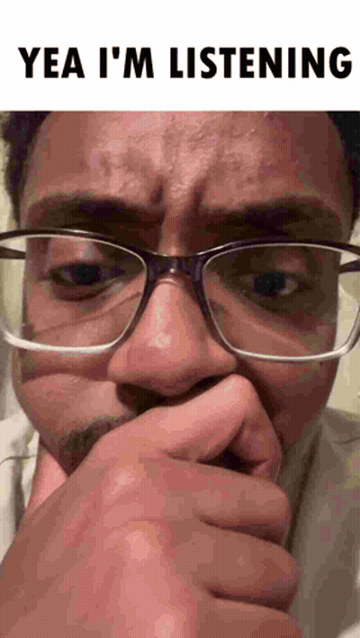 Man With Glasses Covering Mouth Making Funny Face GIF