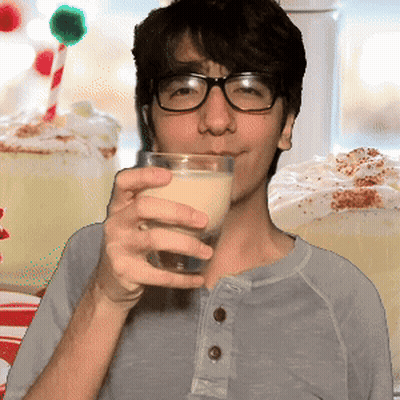 Man With Glasses Drinking From Glass With Straw GIF