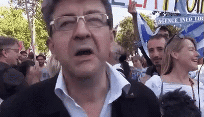 Man With Glasses Holding Agence Info Sign GIF