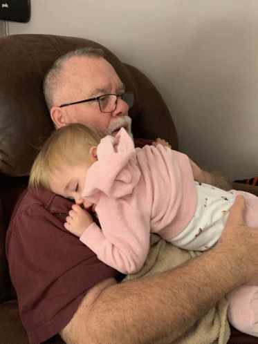 Man With Glasses Holding Baby GIF