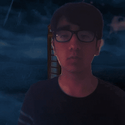 Man With Glasses Holding Banana GIF
