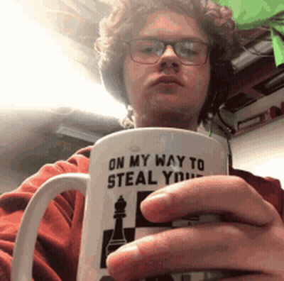 Man With Glasses Holding Coffee Mug Saying On My Way To Steal You GIF