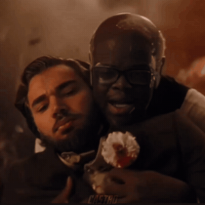 Man With Glasses Holding Flower GIF
