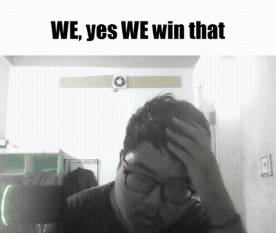 Man With Glasses Holding Forehand In Front Of We Yes We Win Sign GIF