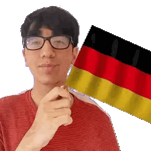 Man With Glasses Holding German Flag Sticker