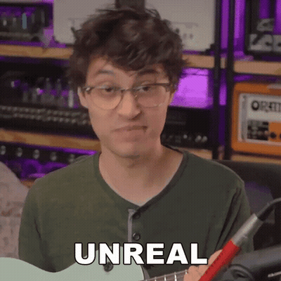 Man With Glasses Holding Guitar Saying Unreal GIF
