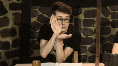 Man With Glasses Holding Hand To Face GIF