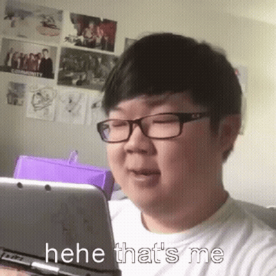 Man With Glasses Holding Nintendo 3DS Making Funny Face GIF