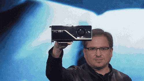 Man With Glasses Holding NVIDIA Graphics Card GIF