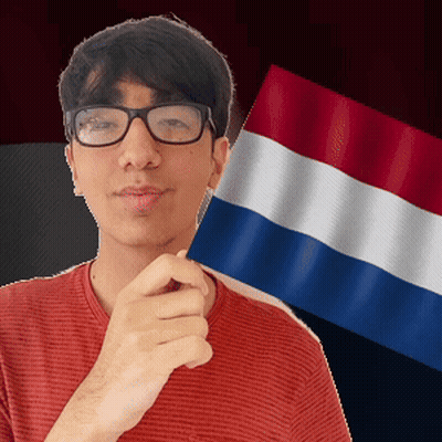 Man With Glasses Holding Small Flag GIF