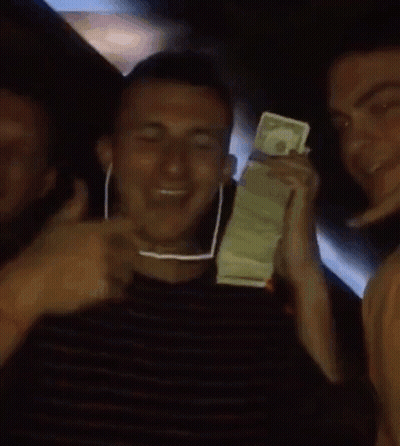 Man With Glasses Holding Stack Of Money GIF