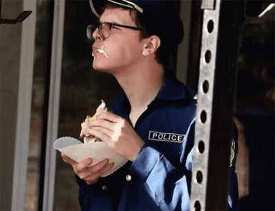 Man With Glasses Holding Stuffed Unicorn Says It's So Fluffy GIF