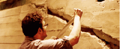 Man With Glasses Holding Tape GIF